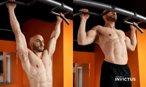 Uomo muscoloso esegue esercizi alla sbarra, mostrando la sua forza e determinazione in palestra.