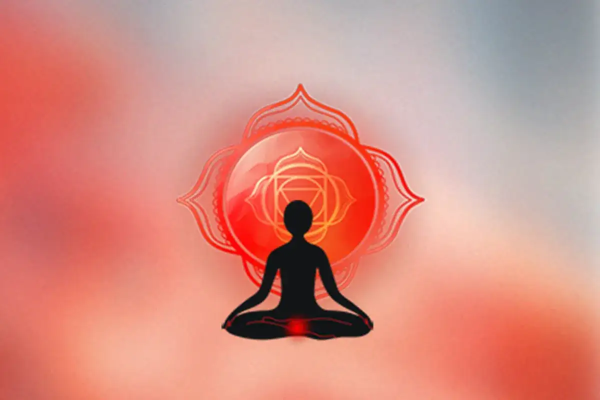 Silhouette in meditazione con simbolo rosso. Il colore rosso, significato psicologico di energia e radicamento, illumina il chakra della radice.